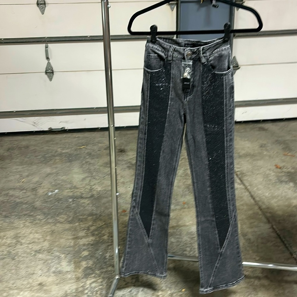 Bebe high waist flared, black jeans with black sequins down the front sides.